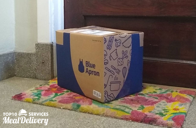 blue apron box at the door