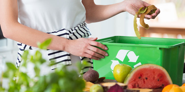 Woman and recycling organic kitchen waste