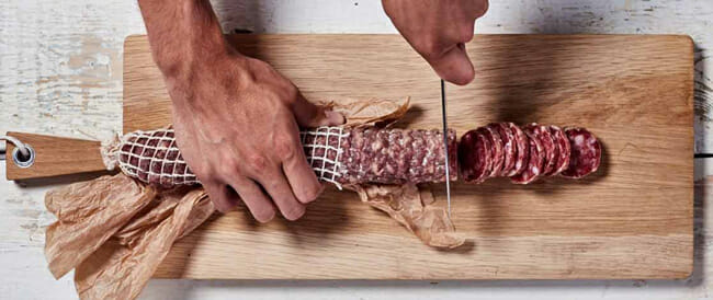 Carnivore-Club sausage on a wooden board