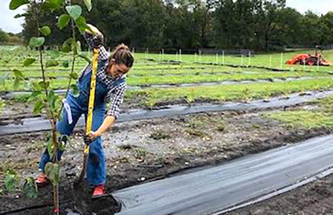 Once Upon A Farm women work on farm